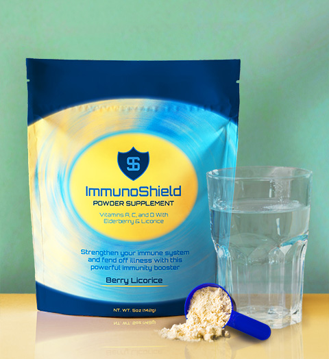Blue and yellow stand-up pouch labeled ImmunoShield Powder Supplement, Berry Licorice, standing beside a glass of water and a scoop of powder on a wooden surface with a green background.